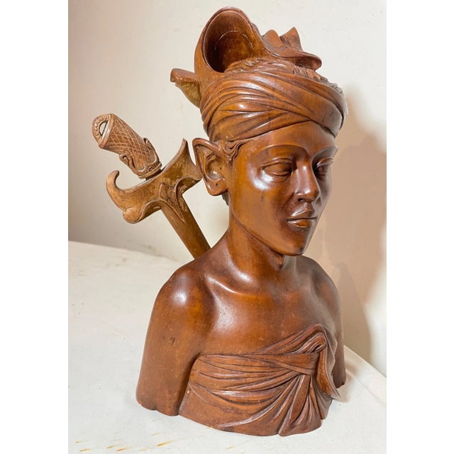 Up for sale is a wonderful antique hand carved wooden Balinese bust sculpture that doubles as a letter opener. It's carved...