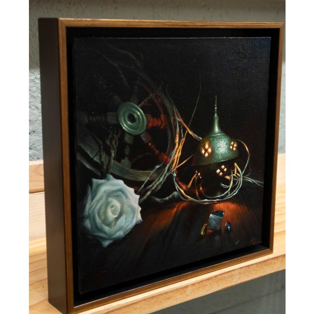 Alchemy #1 presents a meticulously arranged still life that combines organic and metallic elements, creating a sense of...