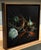 Alchemy #1 presents a meticulously arranged still life that combines organic and metallic elements, creating a sense of...