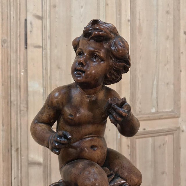 Chestnut 18th Century Hand Carved Wood Statue of a Young Boy For Sale - Image 8 of 11
