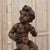 Chestnut 18th Century Hand Carved Wood Statue of a Young Boy For Sale - Image 8 of 11