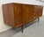 This listing is for a Mid-Century Modern Drexel Declaration Walnut Sideboard. Featuring a straight line design, push doors...