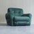 This mid-century armchair from Italy features a distinctive combination of soft, textured upholstery and a sleek metal...