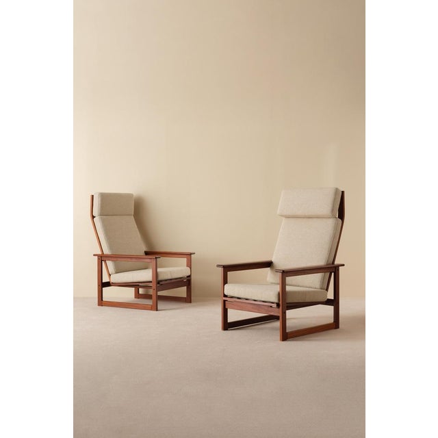 Excellent pair of Easy Chairs by Erik Wørtz model "Florens". Produced in Sweden, late 1960s. Newly reupholstered in Danish...