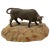 Offering this sculpture of a bronze bull on stone base. Starting with the base is a sand colored stone with some...