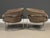 A pair of mid century modern brown chrome barrel back lounge chairs in the style of Milo Baughman. Tweed fabric in very...