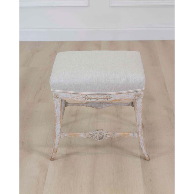 This Gustavian stool was made in Sweden around 1810 in the restrained neoclassical taste of the period. The Gustavian...