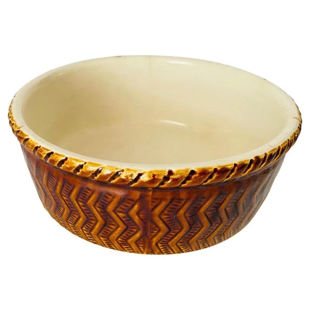 This is a ceramic dish, brown Color made circa 1970 in Belgium. This piece is attributed to the mentioned designer/maker....