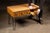 Vintage wooden library card catalog repurposed as a distinctive console or occasional table. The oak case features a...