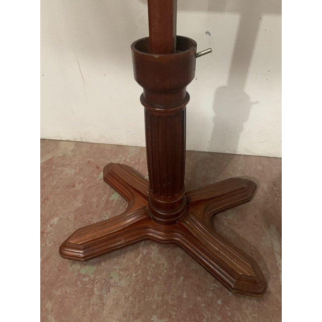 Louis Philippe period serving table in mahogany and veneer. Pivoting system from bottom to top and sliding from right to...