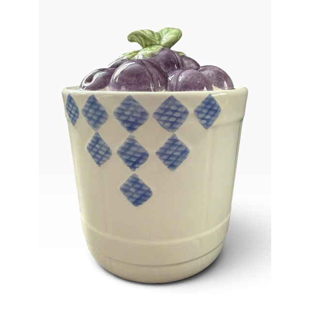 Vintage Treasure Craft Hopscotch Fruit ceramic cookie jar featuring a white ribbed body with blue diamond detailing and a...