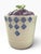Vintage Treasure Craft Hopscotch Fruit ceramic cookie jar featuring a white ribbed body with blue diamond detailing and a...