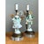 This pair of figural lamps captures a courting couple rendered in fine bisque porcelain, dressed in elegant 18th-century-...