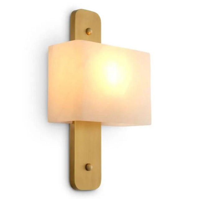 Pair of antique brass and alabaster wall lamp. The rectangular fixture combines a softly veined, translucent alabaster...