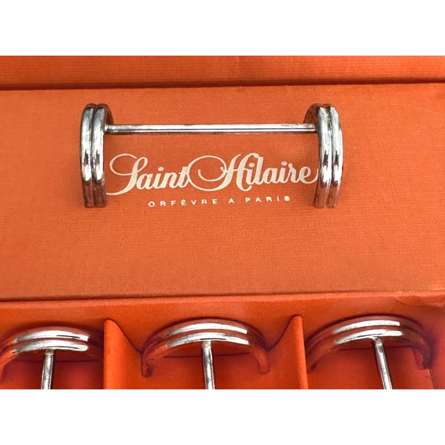 Set of 12 silver-plated metal knife rests, Saint Hilaire silversmiths, Arche pattern Delivered in original boxes...
