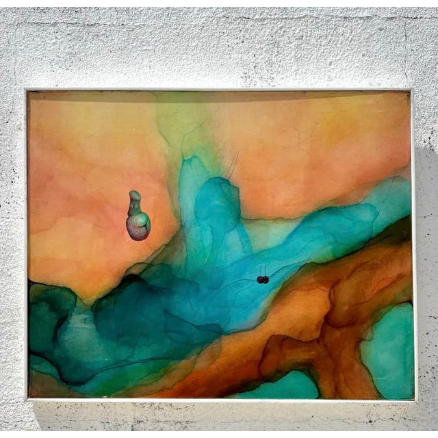 A layered and dreamlike mixed media composition, this piece blends warm washes of burnt orange, ochre, and soft brown with...