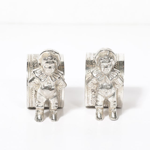 This charming Pair of Victorian Silver-Plated 'Eton Boy' Napkin Holders originated in the United States, circa 1880. Each...