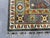 Slate Gray Kazak Style Rug With Floral Medallions and Blue Border, 3'3" X 4'9" For Sale - Image 12 of 13