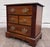 This is a vintage Broyhill Premier bachelor’s chest or nightstand featuring a warm cherry finish, four-drawer...