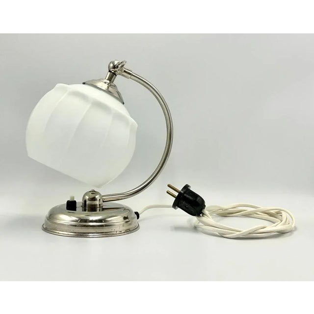 Art Deco Polish Bedside Table Lamp, 1950s, in Flawless conditions. Designed 1920 to 1949 This piece has an attribution...