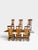 This antique Elizabethan Jacobean style solid oak refectory dining table, accompanied by six chairs, dates to...