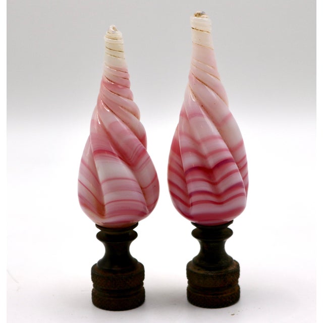 Elevate your lighting with this striking pair of vintage hand-blown art glass lamp finials. Each finial features a...