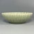 This shallow‑form bowl is made of authentic Longquan Celadon. It features classic celadon‑green glaze with evenly‑spaced...