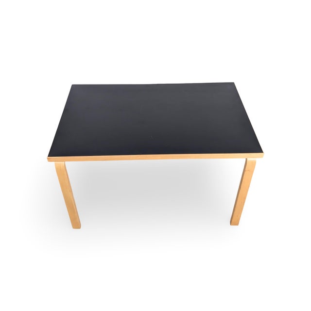 Beautiful dining table from the traditional Finnish manufacturer Artek for sale. Designed by Alvar Aalto in 1935, it has...