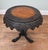 Fine quality carved Burmese tip table with a finely carved top and base The carving is very ornate as is typical with...