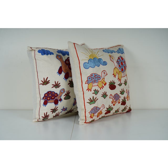 Uzbek Suzani Pillow Cover Elevate your home decor with our Turkish Suzani Pillow Cover, featuring exquisite vintage Uzbek...