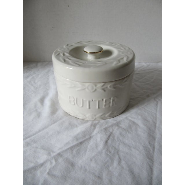 Vintage Ceramic Butter Crock With Flowers, "BUTTER" written on one side, the other has flower design. Marked on reverse,...