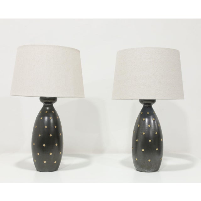 Elevate your home decor with this beautifully crafted pair of Raymor ceramic pottery lamps, complete with elegant linen...