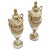 Pair of antique Belgian marble and ormolu urns with gilt bronze fruit finial and gilt bronze caryatid face handles. Gilt...