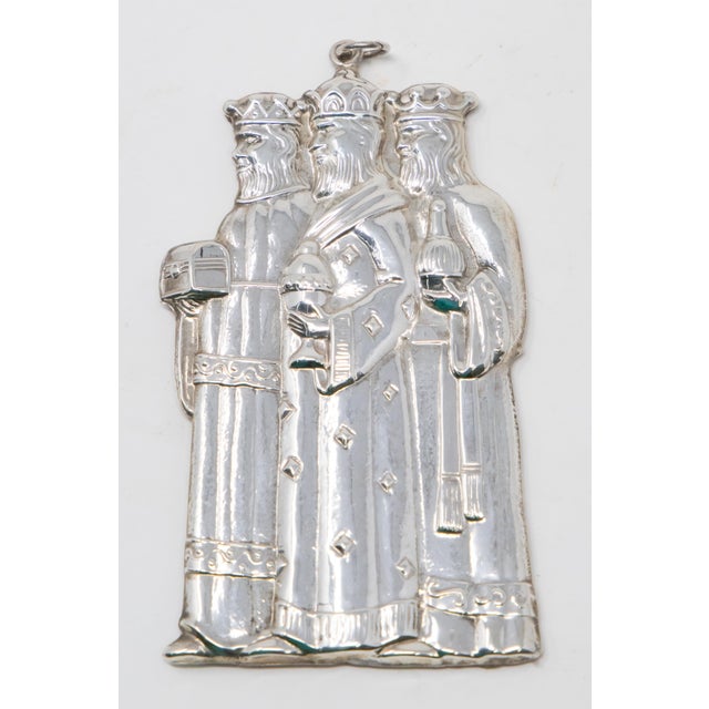 Offering this ornament of the three wise men by Gorham. The ornament depicts the three wise men standing. One holding a...