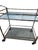 Beautiful Vintage faux bronze bar cart in excellent condition. Minor ware. Please note the glass top is clear because you...