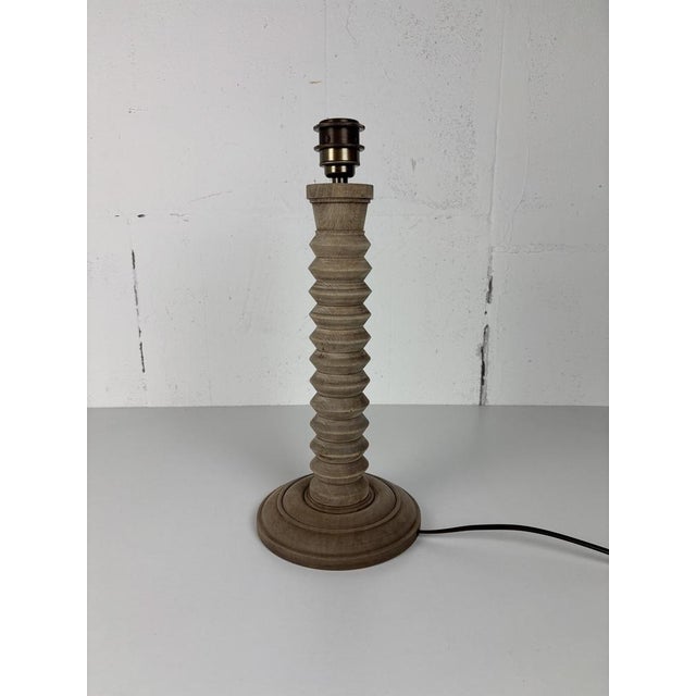 Splendid "unfinished" wood turned table lamp in teh manner of Dudouyt. This lamp at one point in time was most likely...