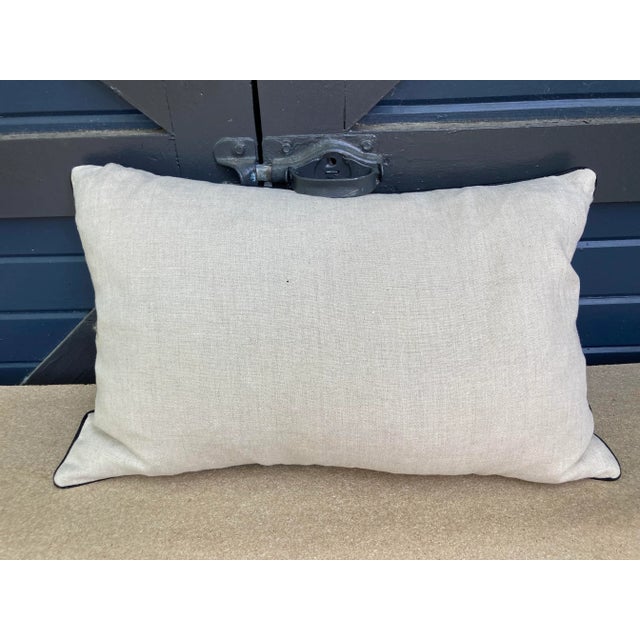 A pillow made from a malachite design printed cotton, backed with Belgian linen, a down insert is included.