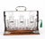 This is a superb antique Edwardian coromandel cased three decanter George Betjemann’s & Sons patent tantalus, with...