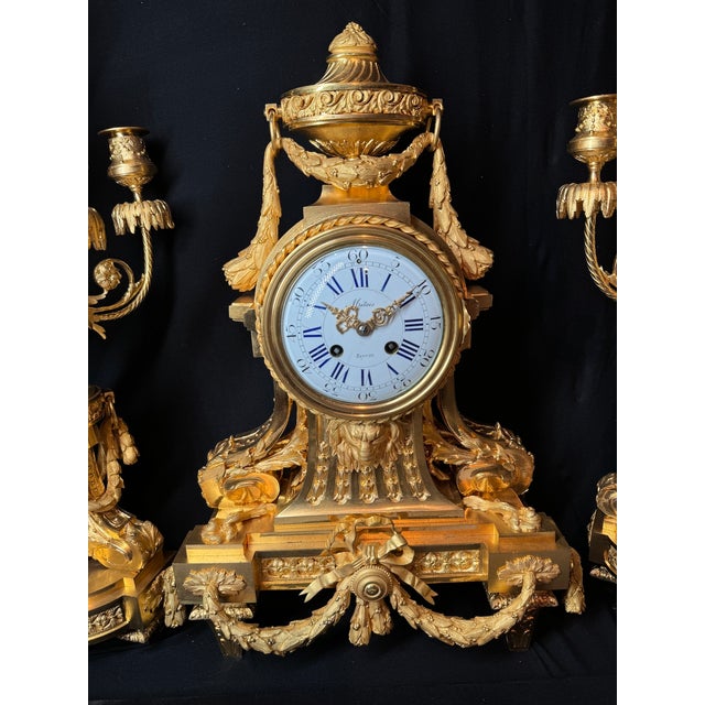 ⭐ Outstanding 19th-Century French Louis XVI Clock Garniture (c. 1860) Presented here is a rare and fully original three-...