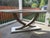 Ensemble Collection by Maitland-Smith White finish Symmetrical, sculptural console table Formed of White Oak Wood wrapped...