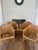 A striking set of four vintage McGuire Furniture barrel-back dining chairs featuring the California maker’s signature...