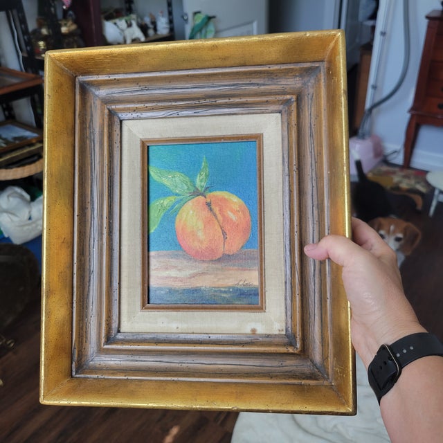 The product is a vintage, original oil painting of a still life featuring a peach. Created by artist D. Dittoe in the...