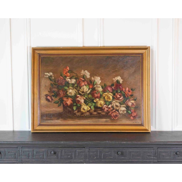 An oil on panel signed Ivan Gorini, this twentieth-century French work depicts a still life of flowers. The floral still...