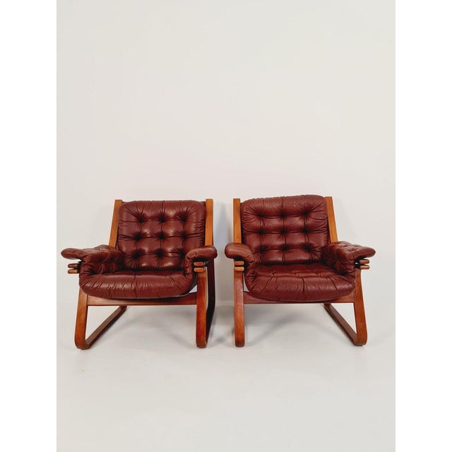 Leather Scandinavian Swedish easy chair, arm chair 1970’s, by Carl-Henrik Spark for Ulferts Sweden The price is for a pair...