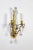 A pair of exquisite gilded brass, 2-light candlestick sconces with scroll details, variously shaped cut crystals in flower...