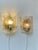 Fagerlund Ice wall lights manufactured by Orrefors in Sweden during the 1960s. The textured crystal glass shading creates...
