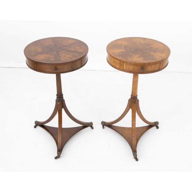 Pair of Biedermeier Style Flame Mahogany Tripod Side Tables, the round tops with single drawers on three legs conjoined by...
