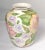 Mid-Century Modern Vintage Coastal Ceramic hand painted Vase in pastel Colors with Flower Motifs all around. Glazed inside...