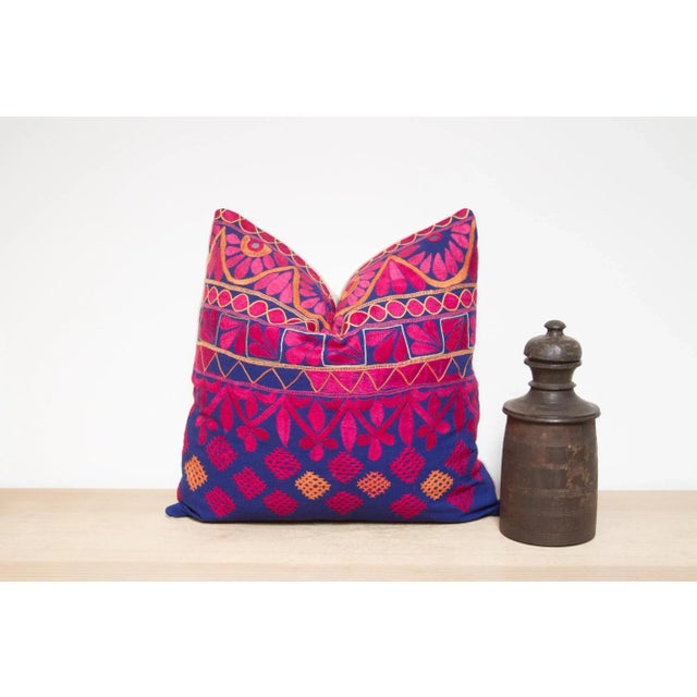 A lovely hand-embroidered pillow made from vibrant vintage tribal skirts coupled with a new linen back. This intricate...