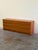 Authentic Danish Mid Century Modern teak dresser featuring a clean minimalist design and beautifully sculpted integrated...